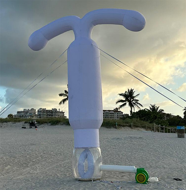 inflatable IUD on the beach with sunset